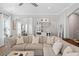 Comfortable living room with a large sectional sofa and a view of the front entrance at 2802 Cavalcade Cir, Johns Island, SC 29455