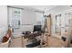Bright office with a view, featuring wood floors, dual monitors and French doors for a private workspace at 2802 Cavalcade Cir, Johns Island, SC 29455
