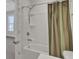 Bathroom featuring a tub with shower head and earth tone striped shower curtain at 2820 Merriams Dr, Charleston, SC 29414