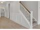 Foyer featuring a staircase with wood and white trim and wainscotting at 2820 Merriams Dr, Charleston, SC 29414