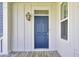 Inviting front door entrance with a classic lantern and detailed trim work for a warm and stylish welcome at 2820 Merriams Dr, Charleston, SC 29414