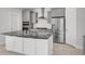 Kitchen with a large center island with granite countertops and stainless steel appliances at 2820 Merriams Dr, Charleston, SC 29414