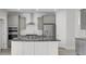 Kitchen featuring gray cabinets, stainless steel appliances, granite countertops, and a center island at 2820 Merriams Dr, Charleston, SC 29414