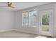Bright living room with light-colored flooring and lots of natural light from the windows and door at 2820 Merriams Dr, Charleston, SC 29414