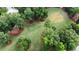 Aerial view of community park featuring lush greenery, mature trees, and open spaces for outdoor activities at 2820 Merriams Dr, Charleston, SC 29414