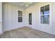 Cozy outdoor porch with wood flooring and views of the home's exterior at 2820 Merriams Dr, Charleston, SC 29414