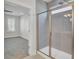 Modern shower with tiled surround, glass door, adjacent to a bedroom at 2820 Merriams Dr, Charleston, SC 29414