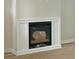 Modern fireplace with white trim that serves as the perfect place for cozy gatherings at 3006 Sweetwater Ln, Awendaw, SC 29429