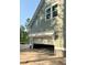 Open garage showcasing ample space and natural light, providing convenient parking at 3006 Sweetwater Ln, Awendaw, SC 29429