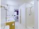 Bright bathroom featuring a double sink vanity, step-in shower, and an adjacent bedroom view at 3009 Mapleleaf Dr, Moncks Corner, SC 29461