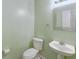 Charming half bathroom with pedestal sink and modern fixtures at 3009 Mapleleaf Dr, Moncks Corner, SC 29461
