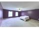 Spacious bedroom with a ceiling fan and two windows for natural light at 3009 Mapleleaf Dr, Moncks Corner, SC 29461