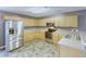 Bright kitchen features stainless steel appliances and plenty of wooden cabinetry at 3009 Mapleleaf Dr, Moncks Corner, SC 29461