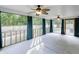 Spacious covered patio with ceiling fans and backyard view, great for entertaining at 3009 Mapleleaf Dr, Moncks Corner, SC 29461