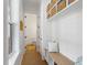 Hallway offers convenient storage and access to a well-appointed powder room for guests at 3023 Eventide Dr, Johns Island, SC 29455