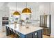 Bright kitchen with white cabinets, stainless steel appliances, and large island with seating at 3023 Eventide Dr, Johns Island, SC 29455