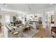 Spacious living room seamlessly connected to a well-equipped kitchen, ideal for modern living at 3023 Eventide Dr, Johns Island, SC 29455