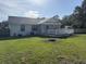 Spacious backyard with a wooden deck, perfect for outdoor entertaining and relaxation at 304 Carolina Cir, Walterboro, SC 29488