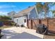 Backyard view of the property with a fenced area, patio, grill, and outdoor seating at 308 Oak Park St, Summerville, SC 29486