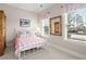 Charming bedroom featuring a white metal bed frame and a light color palette at 308 Oak Park St, Summerville, SC 29486