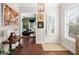 Welcoming foyer with hardwood floors and stylish decor, leading into a cozy living space at 308 Oak Park St, Summerville, SC 29486