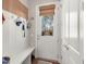 Practical mudroom with a bench, hooks, and storage, providing convenient organization and access at 308 Oak Park St, Summerville, SC 29486