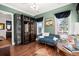 Sitting area featuring a blue sofa and built-in wine rack at 308 Oak Park St, Summerville, SC 29486