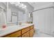 Bathroom with a single sink vanity, white countertop, and shower/tub combo at 310 Christiee Ct, North Charleston, SC 29418