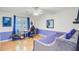 Bedroom or office space featuring a daybed, desk, hardwood floors, and ample natural light at 310 Christiee Ct, North Charleston, SC 29418
