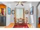 Cozy breakfast nook with skylight, wooden table, and seating for two at 310 Christiee Ct, North Charleston, SC 29418
