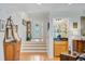 The foyer is bright and inviting, leading to the main living areas and featuring elegant wooden accents at 310 Christiee Ct, North Charleston, SC 29418