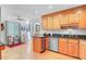 Eat-in kitchen featuring stainless steel appliances, wood cabinets, and a breakfast nook area at 310 Christiee Ct, North Charleston, SC 29418