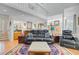 A bright living room area featuring a fireplace, hardwood floors, and comfortable seating at 310 Christiee Ct, North Charleston, SC 29418