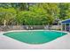 A backyard pool offers a refreshing escape, complemented by comfortable seating for relaxation and entertaining at 310 Christiee Ct, North Charleston, SC 29418