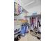 Organized walk-in closet with shelving, hanging rods, and storage for clothes and shoes at 310 Christiee Ct, North Charleston, SC 29418