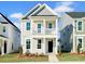 Charming two-story home with a welcoming porch and manicured front yard at 316 O'Malley Dr, Summerville, SC 29483