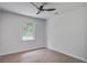Bright bedroom with a ceiling fan and a window view of the outdoors at 3231 Stonehaven Dr, North Charleston, SC 29420