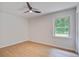Bedroom featuring wood floors, a ceiling fan, and a window at 3231 Stonehaven Dr, North Charleston, SC 29420