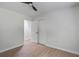 Bedroom featuring wood floors, a ceiling fan, and a closet at 3231 Stonehaven Dr, North Charleston, SC 29420