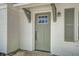 Close up of the exterior of the painted brick facade with an inviting front door at 3231 Stonehaven Dr, North Charleston, SC 29420