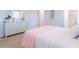 This bedroom features neutral walls and floors, with a dresser and view of the bathroom at 325 Willow Run Dr, Summerville, SC 29486