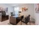This stylish home office features an L-shaped desk with coordinating artwork at 325 Willow Run Dr, Summerville, SC 29486