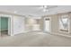 Versatile bonus room with carpet, ample natural light, a ceiling fan and access to the outdoors at 327 Megans Bay Ln, Charleston, SC 29492