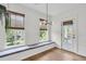 Cozy living room featuring a window seat, modern lighting, and view to the outdoors at 327 Megans Bay Ln, Charleston, SC 29492