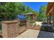 Outdoor grill area with brick base and stainless steel grill, perfect for entertaining at 327 Megans Bay Ln, Charleston, SC 29492