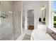 Modern bathroom features a glass shower, soaking tub, and stylish fixtures at 3285 Johnstowne St, Johns Island, SC 29455