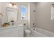Well appointed bathroom featuring a shower/tub combination with white cabinets at 3285 Johnstowne St, Johns Island, SC 29455