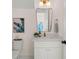 Powder room with elegant mirror, sink, and decorations at 3285 Johnstowne St, Johns Island, SC 29455