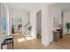 Open foyer with views to living area and powder room, showcasing hardwood floors at 3285 Johnstowne St, Johns Island, SC 29455