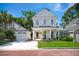 Charming two-story home with a well-manicured front yard and a detached garage at 3285 Johnstowne St, Johns Island, SC 29455